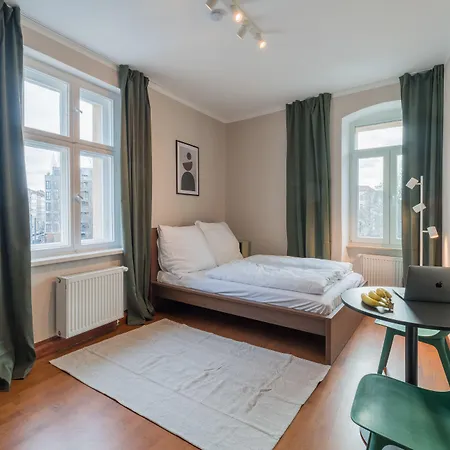 & Aparthotel